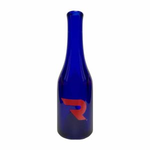 A tall, slender cobalt blue glass bottle with a red stylized "R" logo on its lower half.