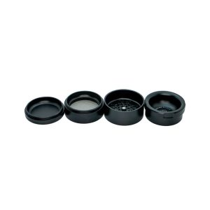 Four black, circular components of a grinder are laid out horizontally on a white background.