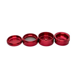 A four-piece, disassembled, glossy red metal grinder with a screen and sharp teeth, on a white background.