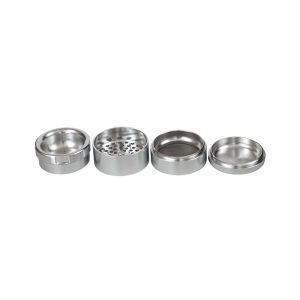 Four shiny, silver, cylindrical metal pieces of a disassembled grinder are arranged in a horizontal line.
