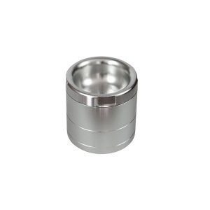 A cylindrical, silver metal container with a recessed top and two horizontal grooves on the side.