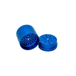 A shiny blue metal herb grinder is open, showing the top piece with spikes and the bottom piece with holes.