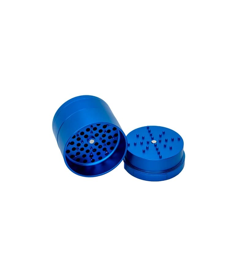 A shiny blue metal herb grinder is open, showing the top piece with spikes and the bottom piece with holes.