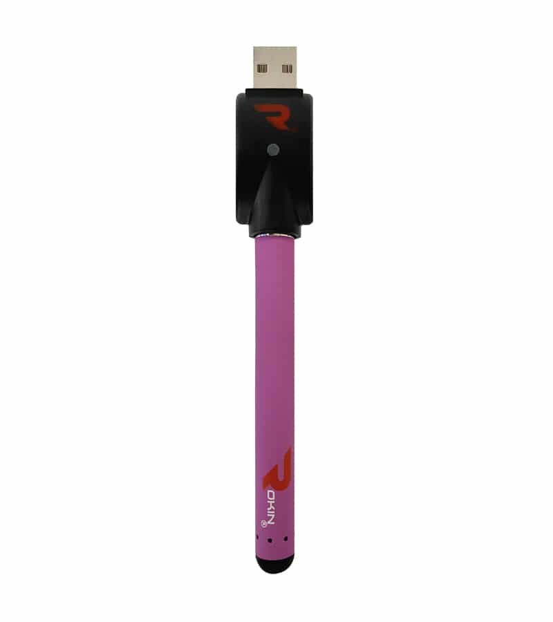 A purple vape pen with "OKIN" and a logo on the side is connected to a black USB charger.