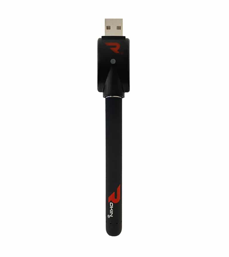 A black pen-style vape battery with a USB charger attached, featuring a red "R" logo and "OKIN" text.