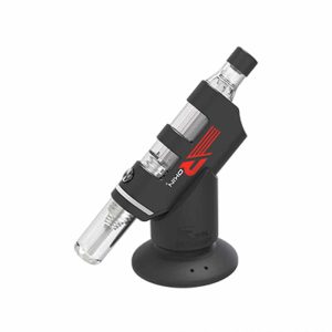 A black and clear vape device with "NIKO" and a red logo on it, resting in a black stand.