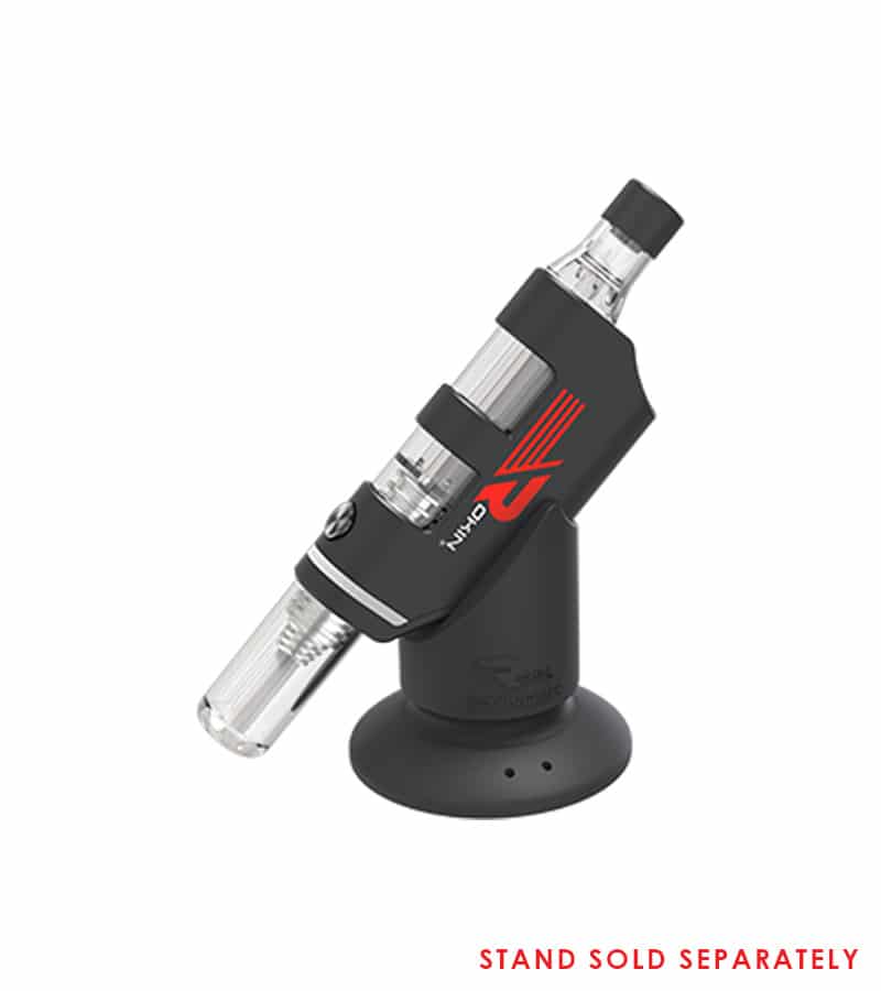 A black and clear vape device with "NIKO" and a red logo on it, resting in a black stand.