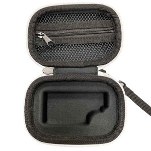 An open white and black zippered hard case with a mesh pocket and a custom-fit foam insert.