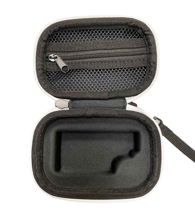 An open white and black zippered hard case with a mesh pocket and a custom-fit foam insert.