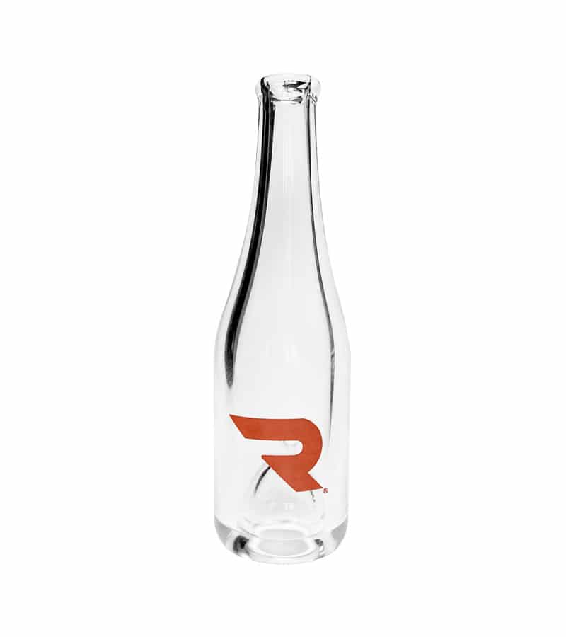 A clear glass bottle with a narrow neck and a red "R" logo on its side.