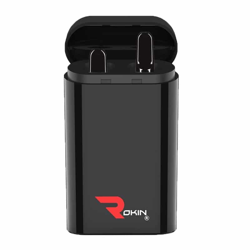 A black charging case for earbuds is open, revealing two black earbuds inside, with "ROKIN" in red.