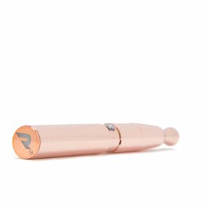 A rose gold, cylindrical device with a "R" logo on one end and a small ball on the other.